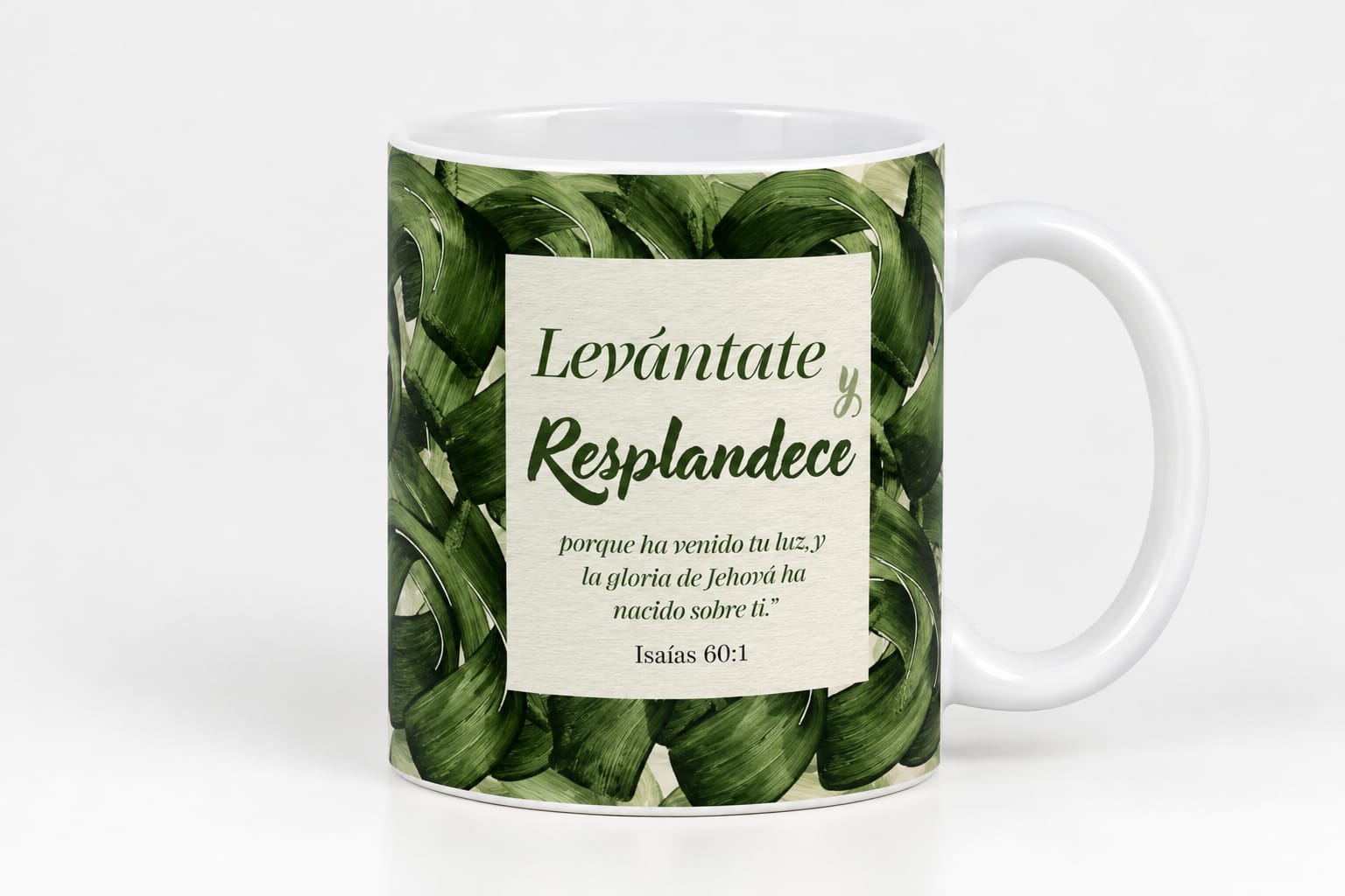 Taza con versículo bíblico Levántate y Resplandece, Isaías 60:1, rodeado de hojas verdes
